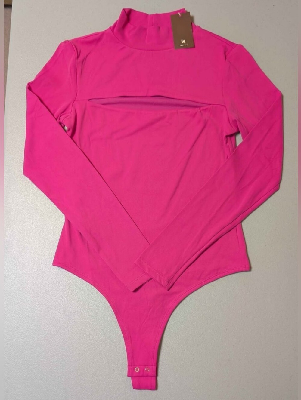 NWT small pink bodysuit by Inlyric